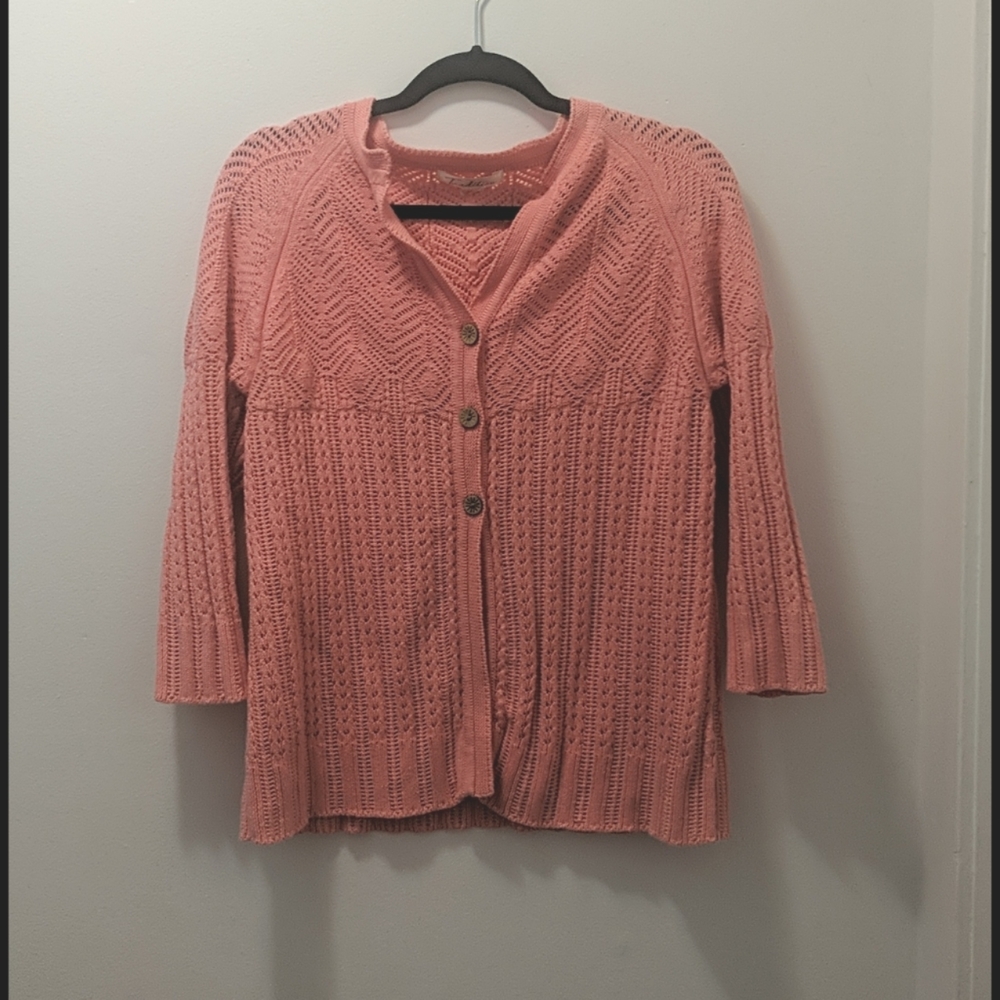 Pink three button cardigan.